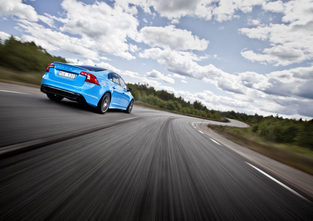 Dynamic driving image of the Volvo S60 Polestar during test photography.