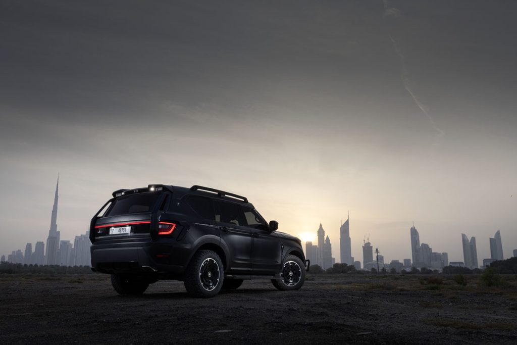 W Motors Ghiath Dubai sunset skyline I bakgrunden 2024