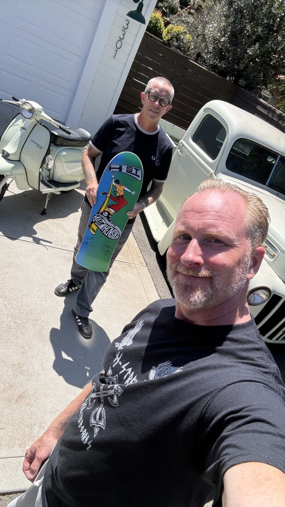 Matt Hensley, his signed board and me.